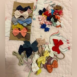 Assortment of some new & used baby girl bows & headbands LITTLE POPPY CO